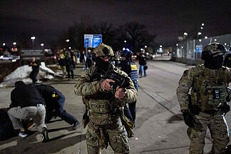 A federal agent shoots a man in the leg after being attacked in Minneapolis