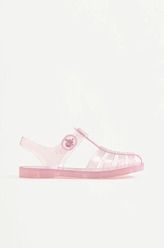 The jelly sandals from our childhood are back and already taking this summer by storm