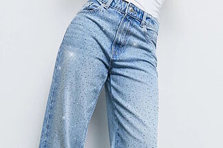 The ultimate trend for company dinners: how to style jeans adorned with glitter, studs, and sequins