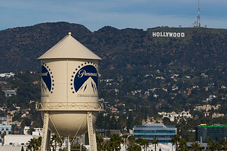 A judge orders Paramount and Warner to halt their merger for at least two weeks