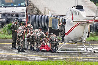 2 trapped workers rescued from a hydropower tunnel 9 days after Nepal floods
