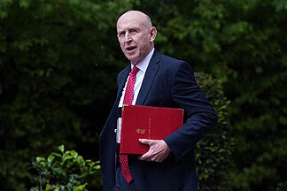 UK defense secretary quits, says government isn't willing to spend enough on military