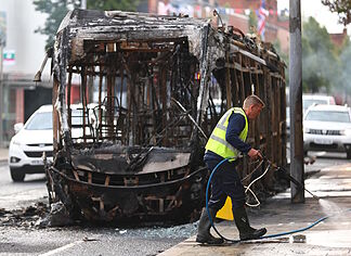 Belfast Burns after the stabbing of a Sudanese refugee by a man that has sparked a wave of far-right protests
